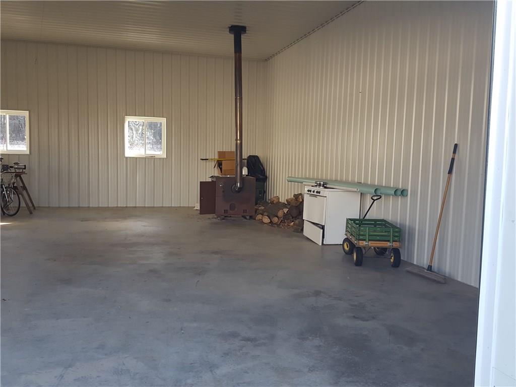 40 Callahan Road Greenville, PA 16125 - Photo 12 of 19 Inside of the 40*96 Garage. 32' is insulated and heated with wood burner