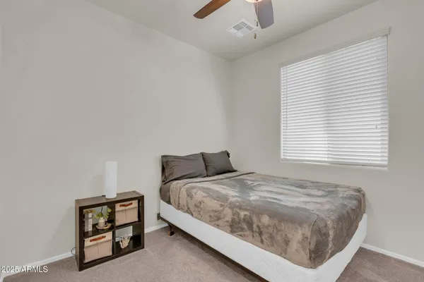 a bathroom with a granite countertop sink and a granite top