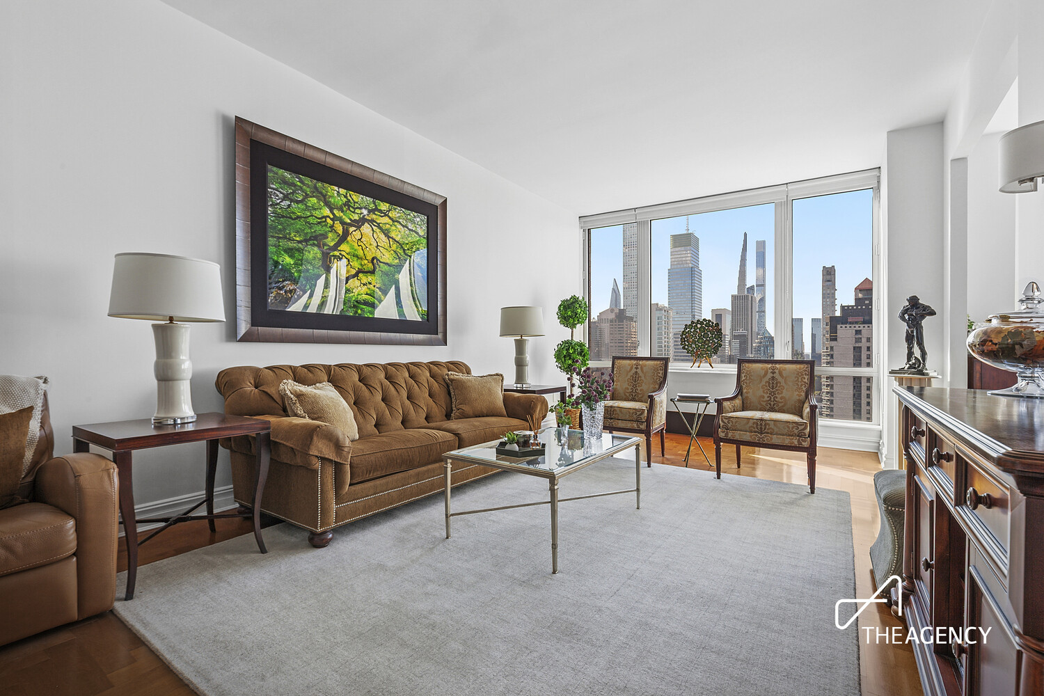 401 East 60th Street, Unit 35B Manhattan, NY 10022 - Photo 11 of 13 a living room with furniture and a flat screen tv