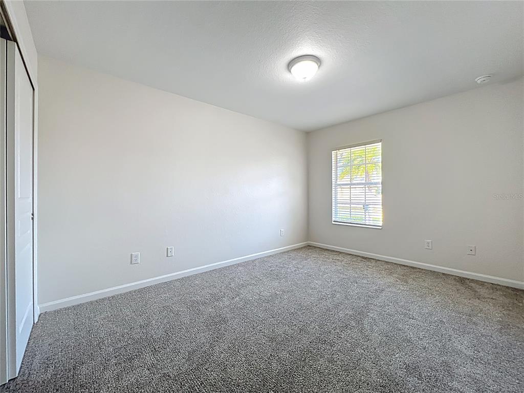 12930 Vennetta Way Windermere, FL 34786 - Photo 24 of 38 an empty room with windows