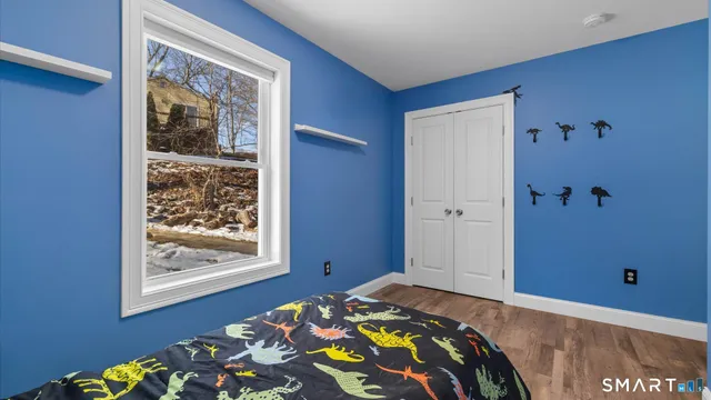 a view of livingroom with furniture and window