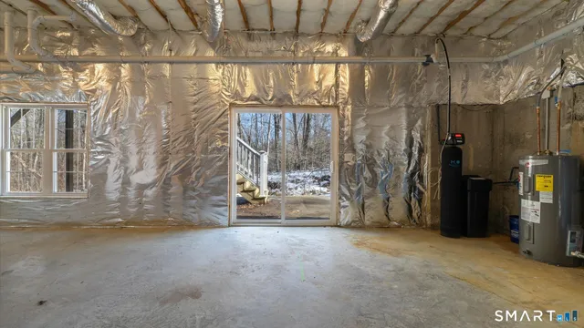 a view of a balcony with wooden floor and fence