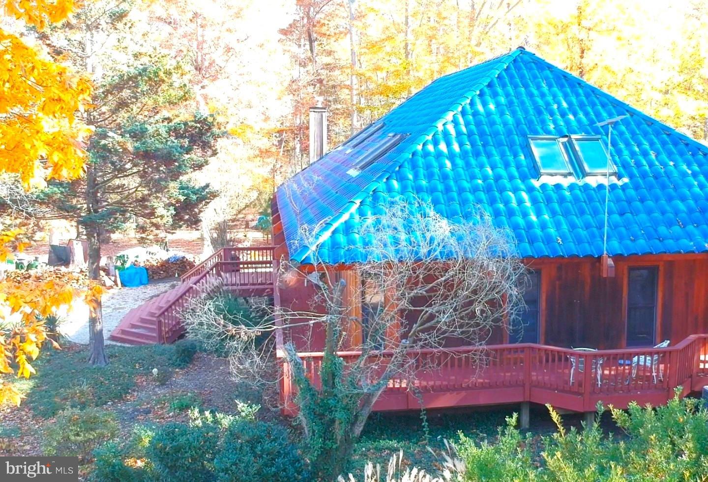 2006 Bennett Point Road Queenstown, MD 21658 - Photo 11 of 58 a view of a house with a backyard