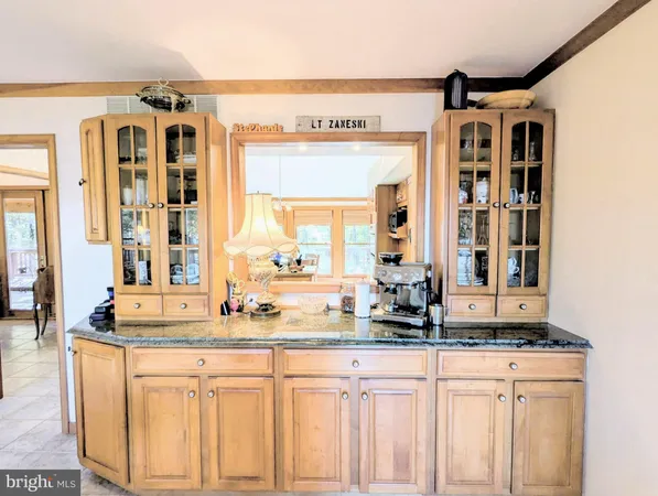 a kitchen with a stove a sink and a refrigerator