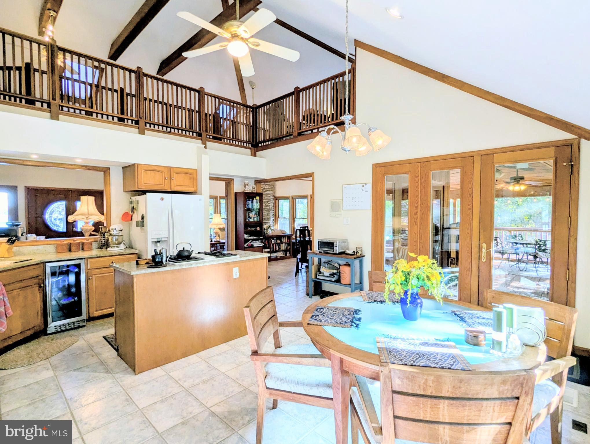 2006 Bennett Point Road Queenstown, MD 21658 - Photo 23 of 58 a kitchen with stainless steel appliances granite countertop a stove and cabinets