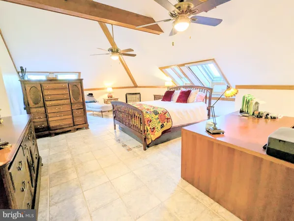 a bathroom with a bathtub a sink and a mirror