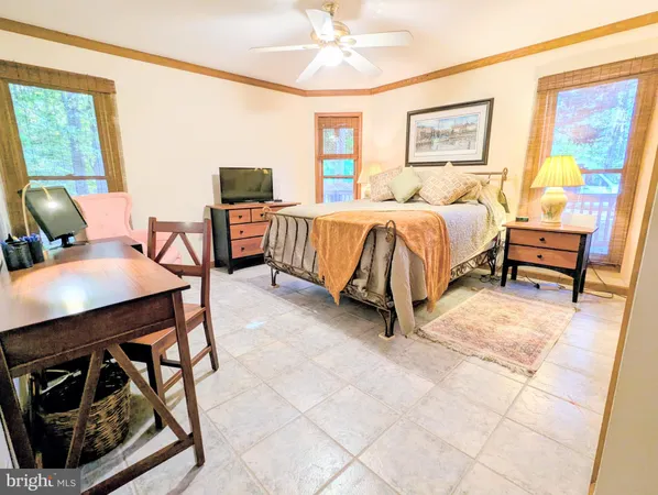 a balcony with wooden floor