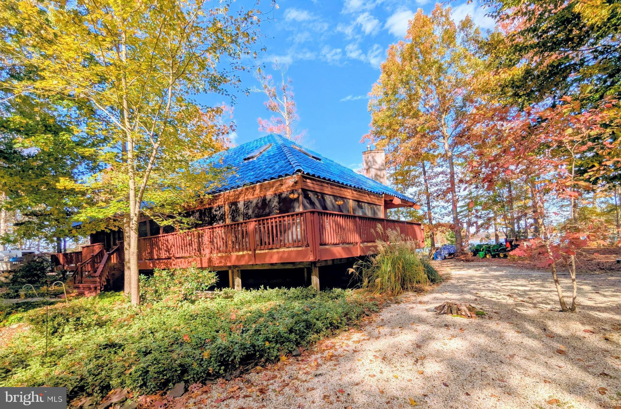 2006 Bennett Point Road Queenstown, MD 21658 - Photo 6 of 58 a front view of a house with a yard