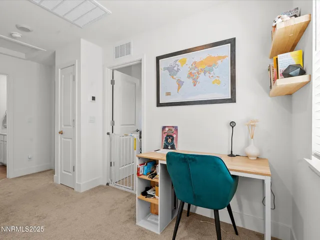 a kitchen that has a sink and a stove in it