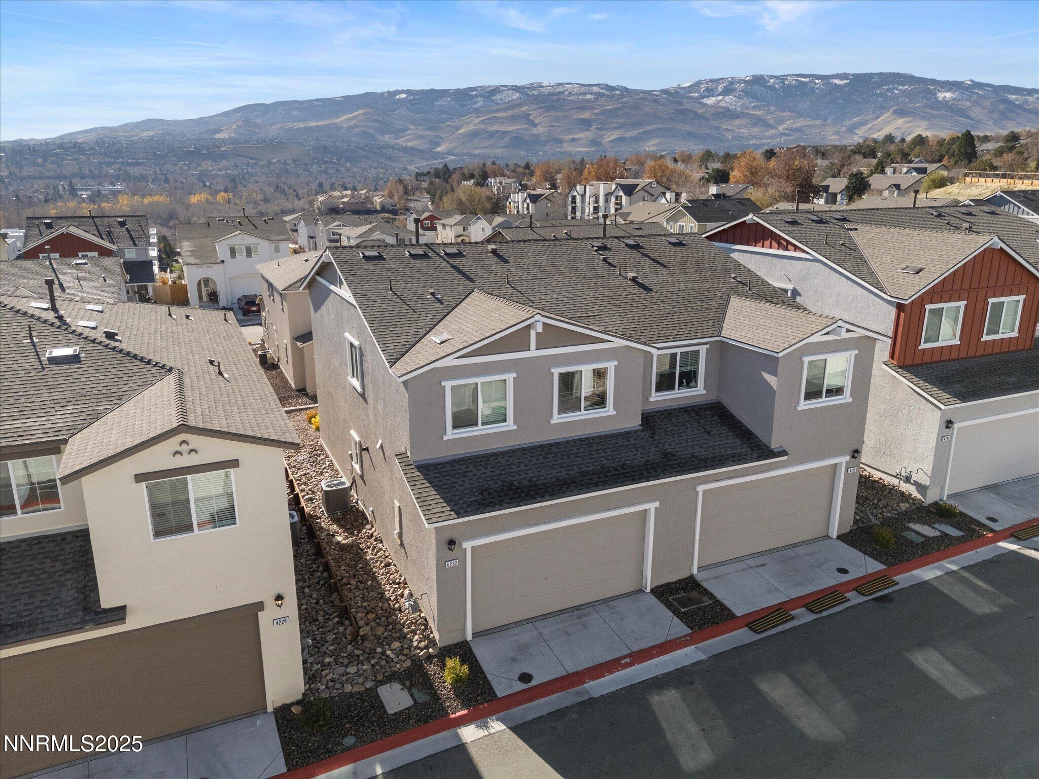 4232 Fawnridge Place Reno, NV 89523 - Photo 27 of 39 an aerial view of a house with a mountain