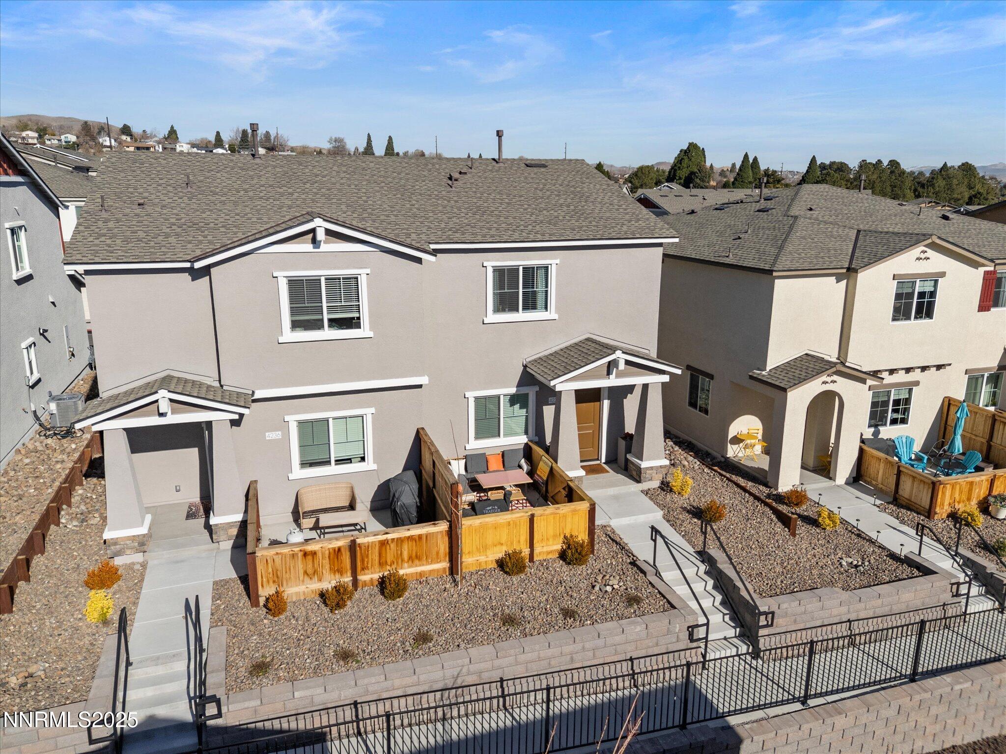 4232 Fawnridge Place Reno, NV 89523 - Photo 31 of 39 an aerial view of a house with large trees