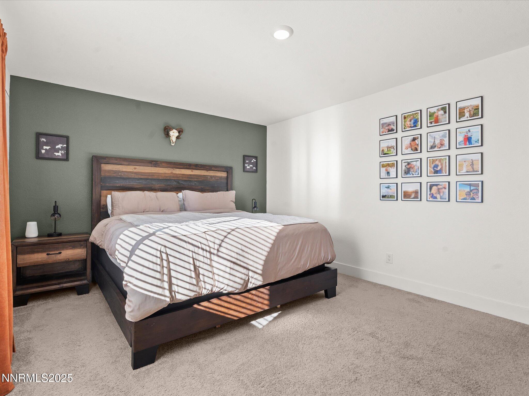 4232 Fawnridge Place Reno, NV 89523 - Photo 10 of 39 a spacious bedroom with a bed and a window