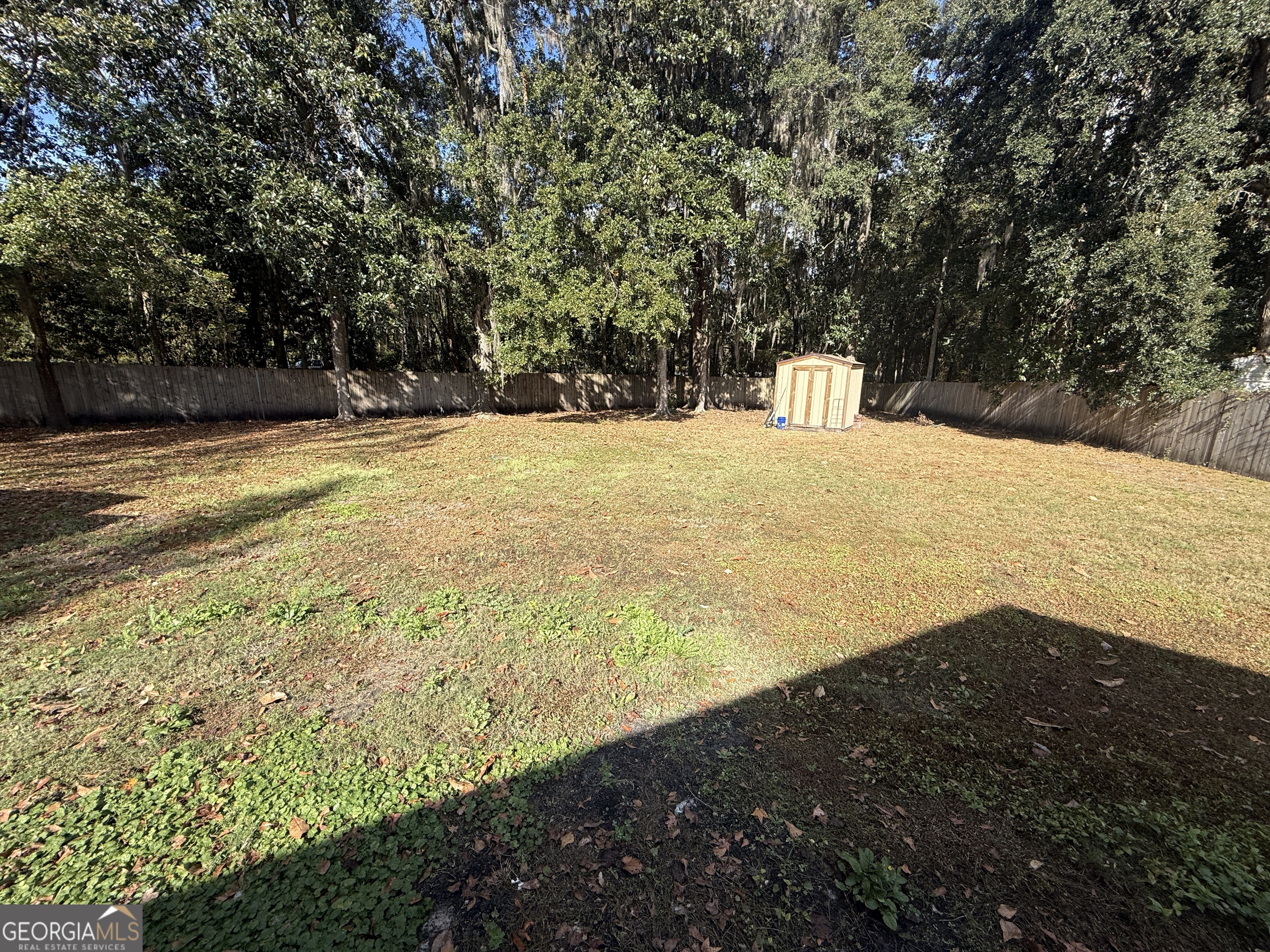 2203 Windsor Street St. Marys, GA 31558 - Photo 14 of 15 a view of outdoor space with trees