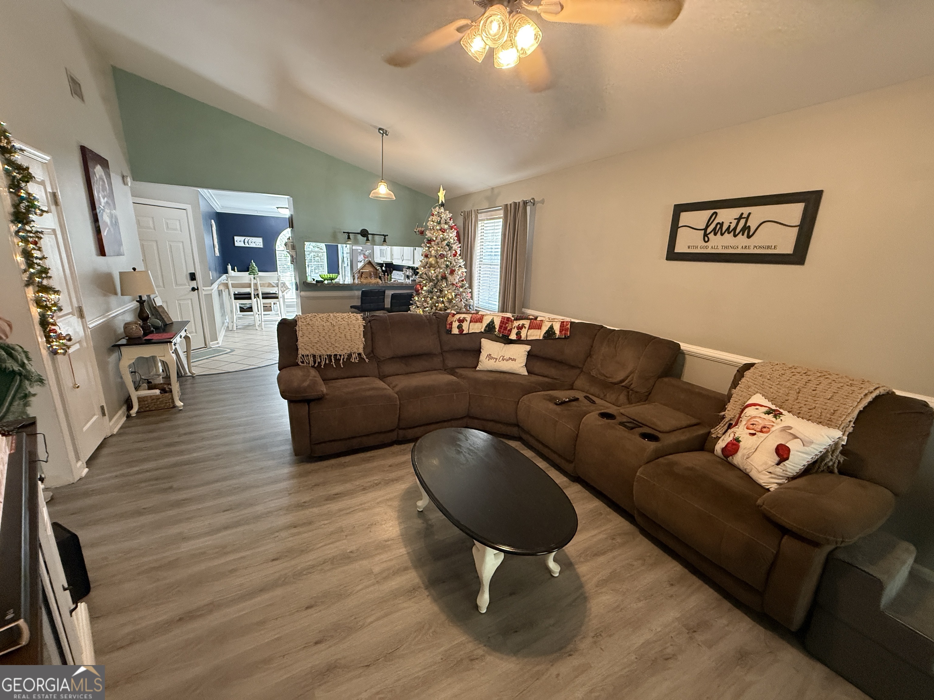 2203 Windsor Street St. Marys, GA 31558 - Photo 6 of 15 a living room with furniture and a wooden floor