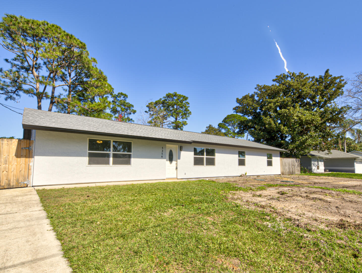 5356 Jamaica Road Cocoa, FL 32927 - Photo 2 of 41 a house view with a garden space