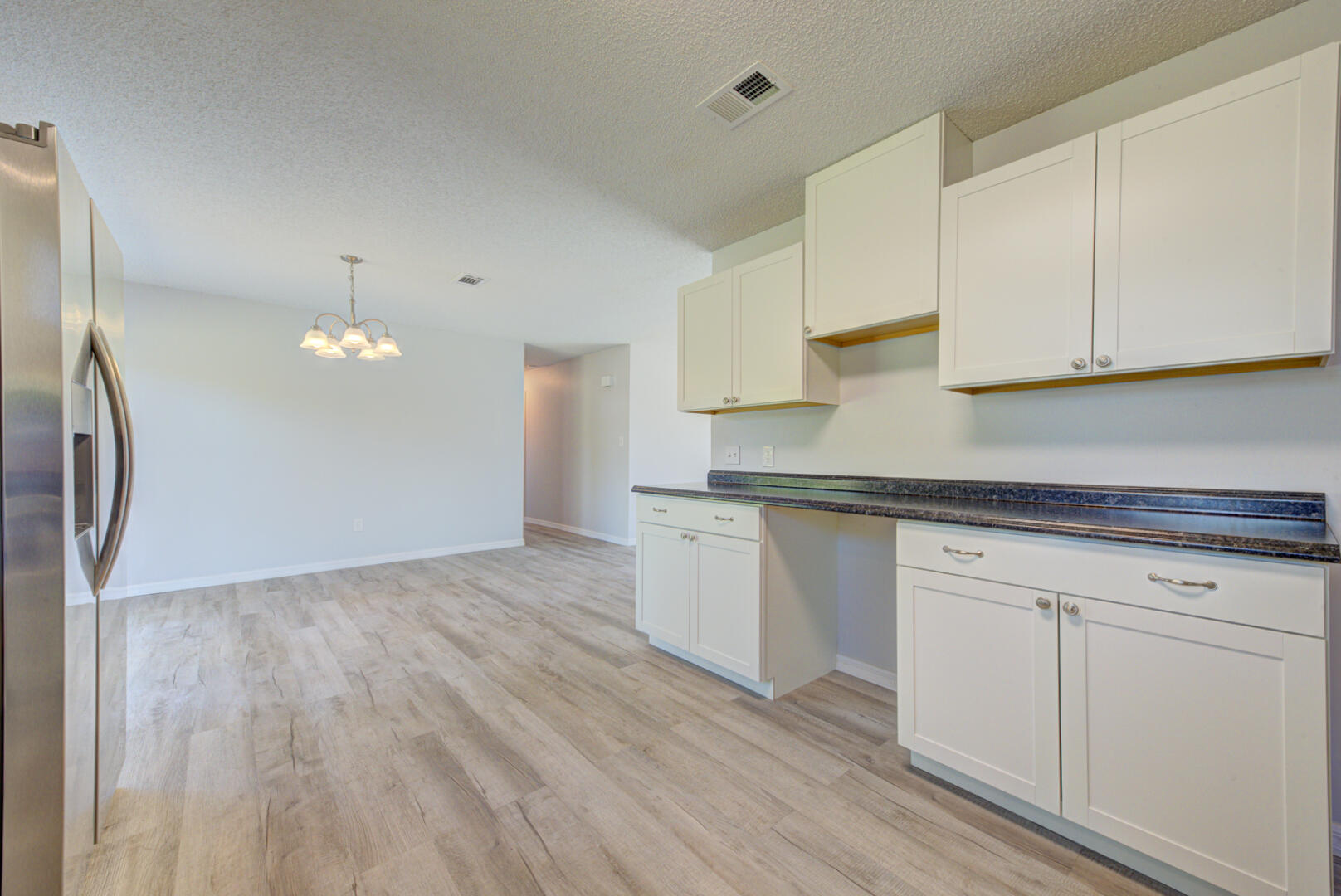 5356 Jamaica Road Cocoa, FL 32927 - Photo 21 of 41 a kitchen with a sink and cabinets