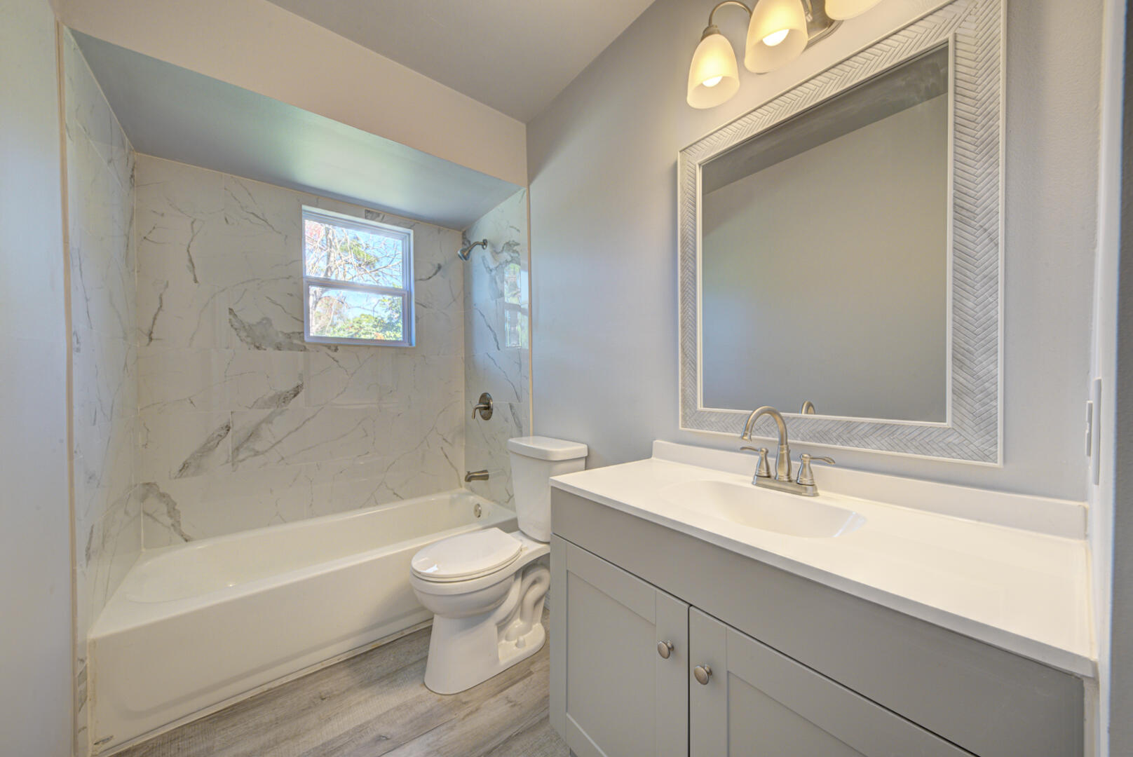 5356 Jamaica Road Cocoa, FL 32927 - Photo 29 of 41 a bathroom with a sink a toilet and a bathtub