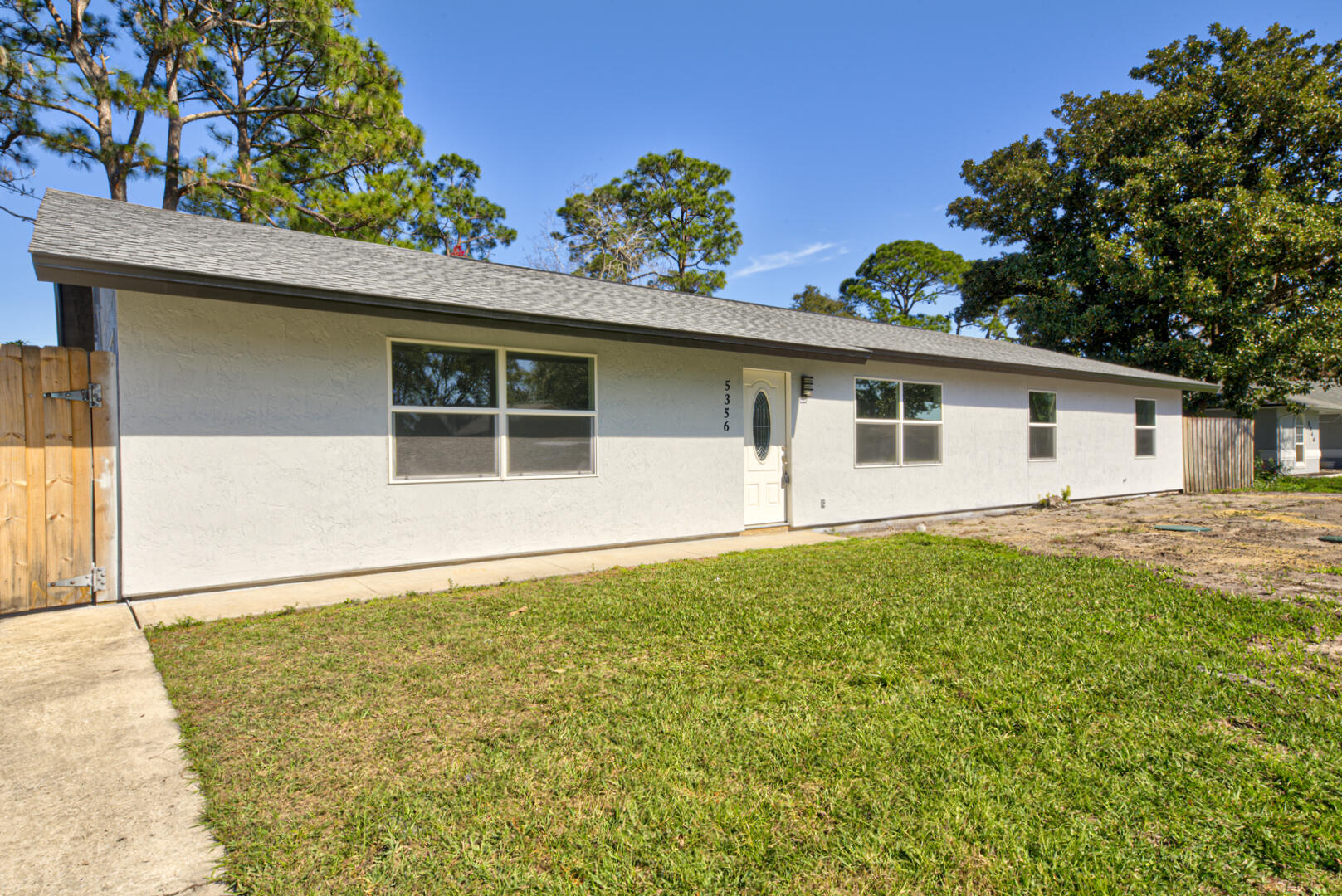 5356 Jamaica Road Cocoa, FL 32927 - Photo 39 of 41 a house view with a garden space