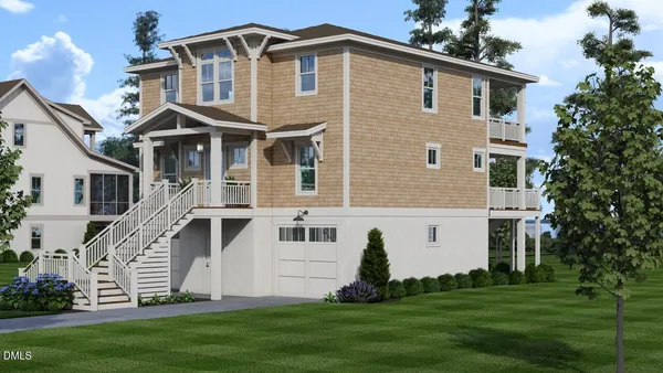 a view of a white house next to a yard with big trees
