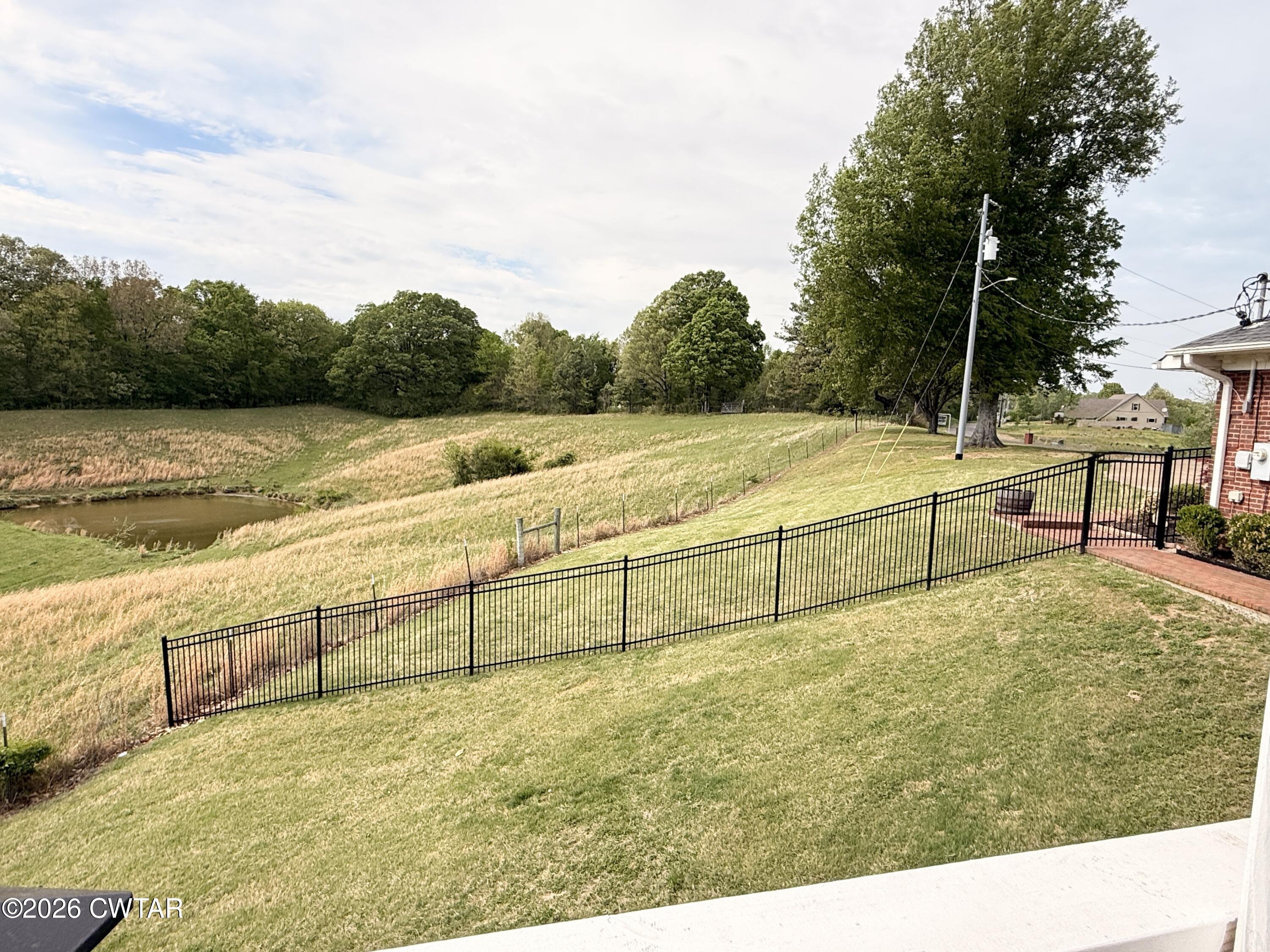 2787 Meacham Road Dyersburg, TN 38024 - Photo 11 of 45 a view of an outdoor space and yard