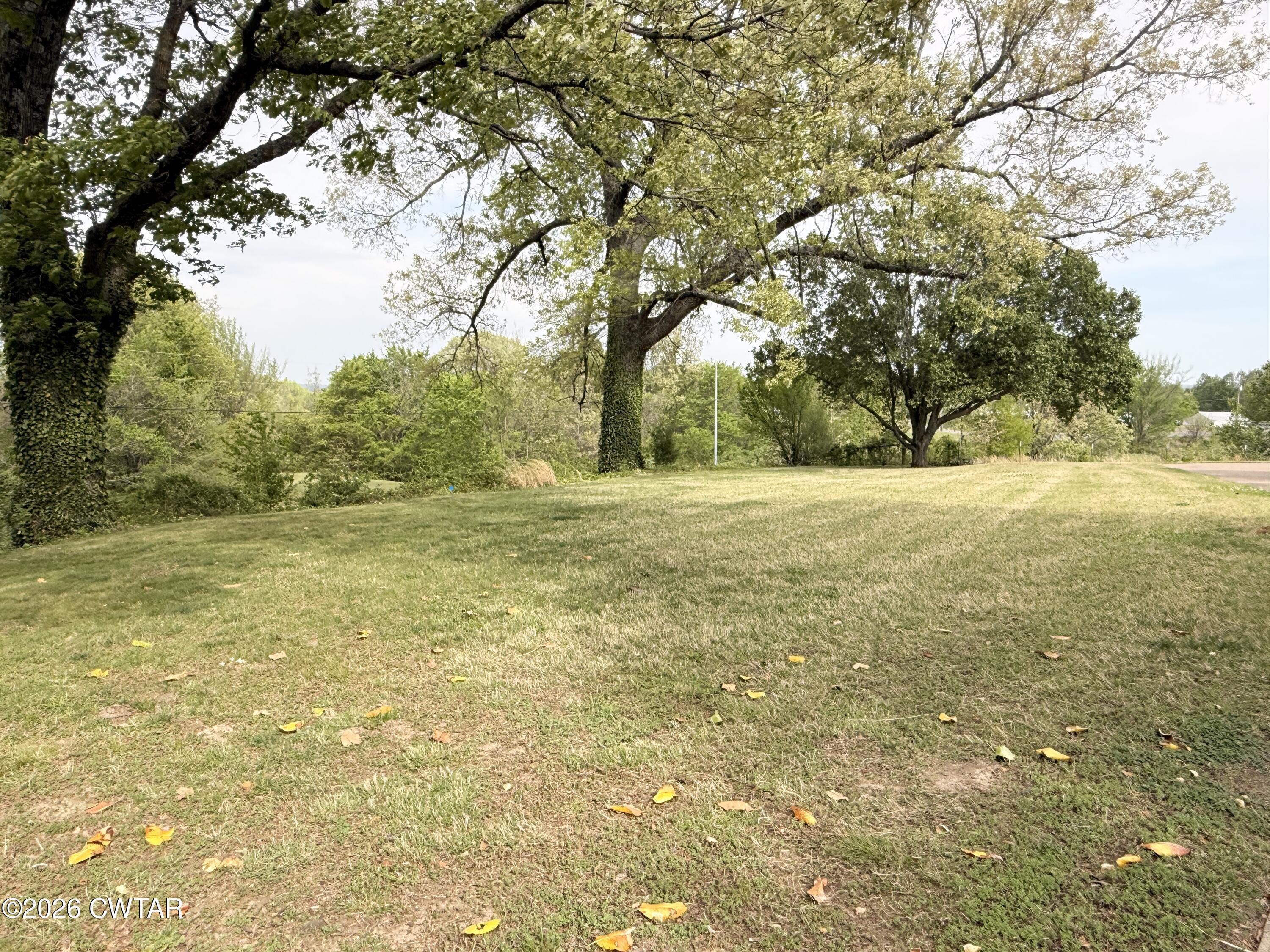 2787 Meacham Road Dyersburg, TN 38024 - Photo 16 of 45 a view of beach and yard