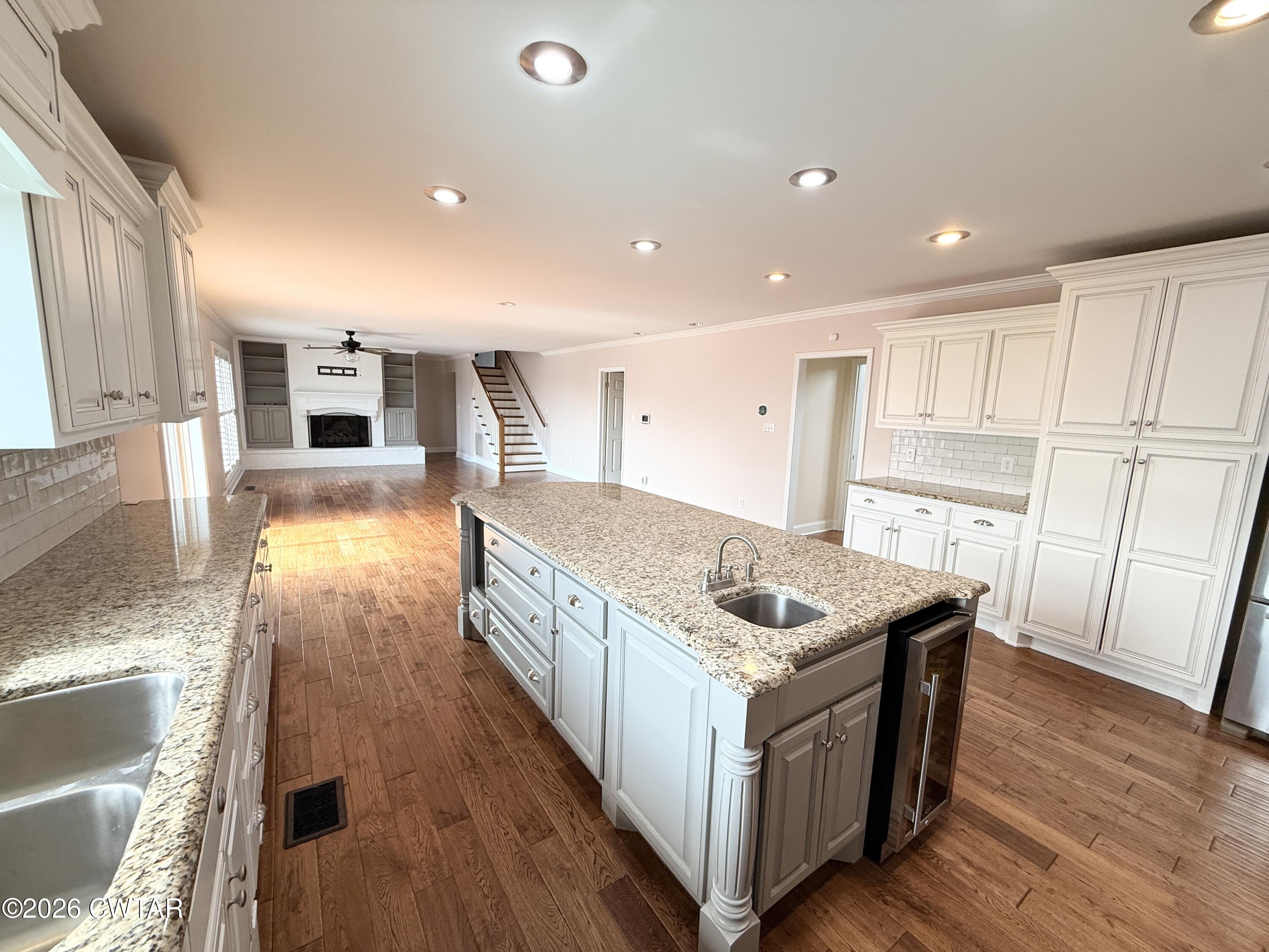 2787 Meacham Road Dyersburg, TN 38024 - Photo 21 of 45 a kitchen that has a lot of cabinets in it