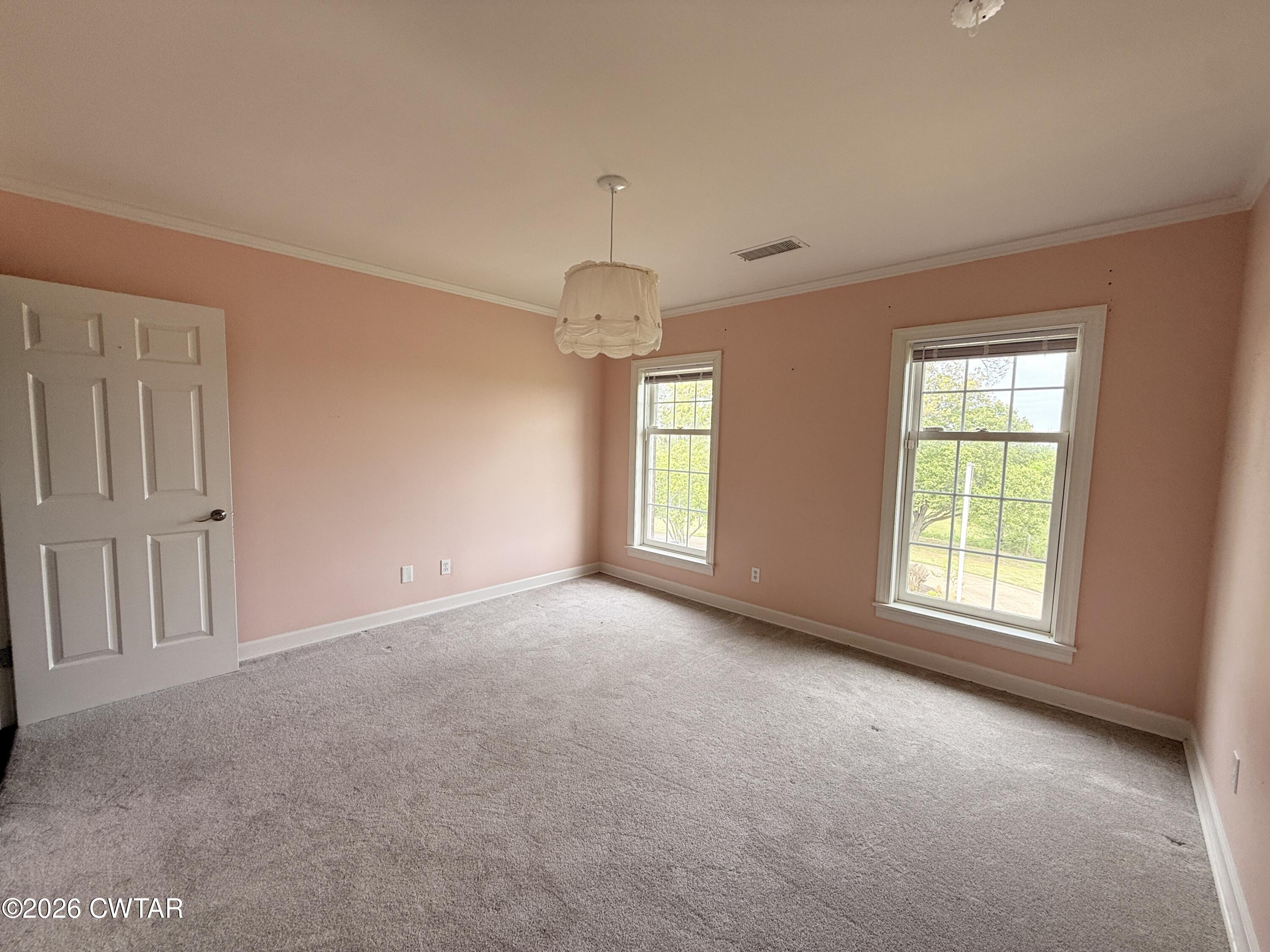2787 Meacham Road Dyersburg, TN 38024 - Photo 33 of 45 a view of an empty room with a window