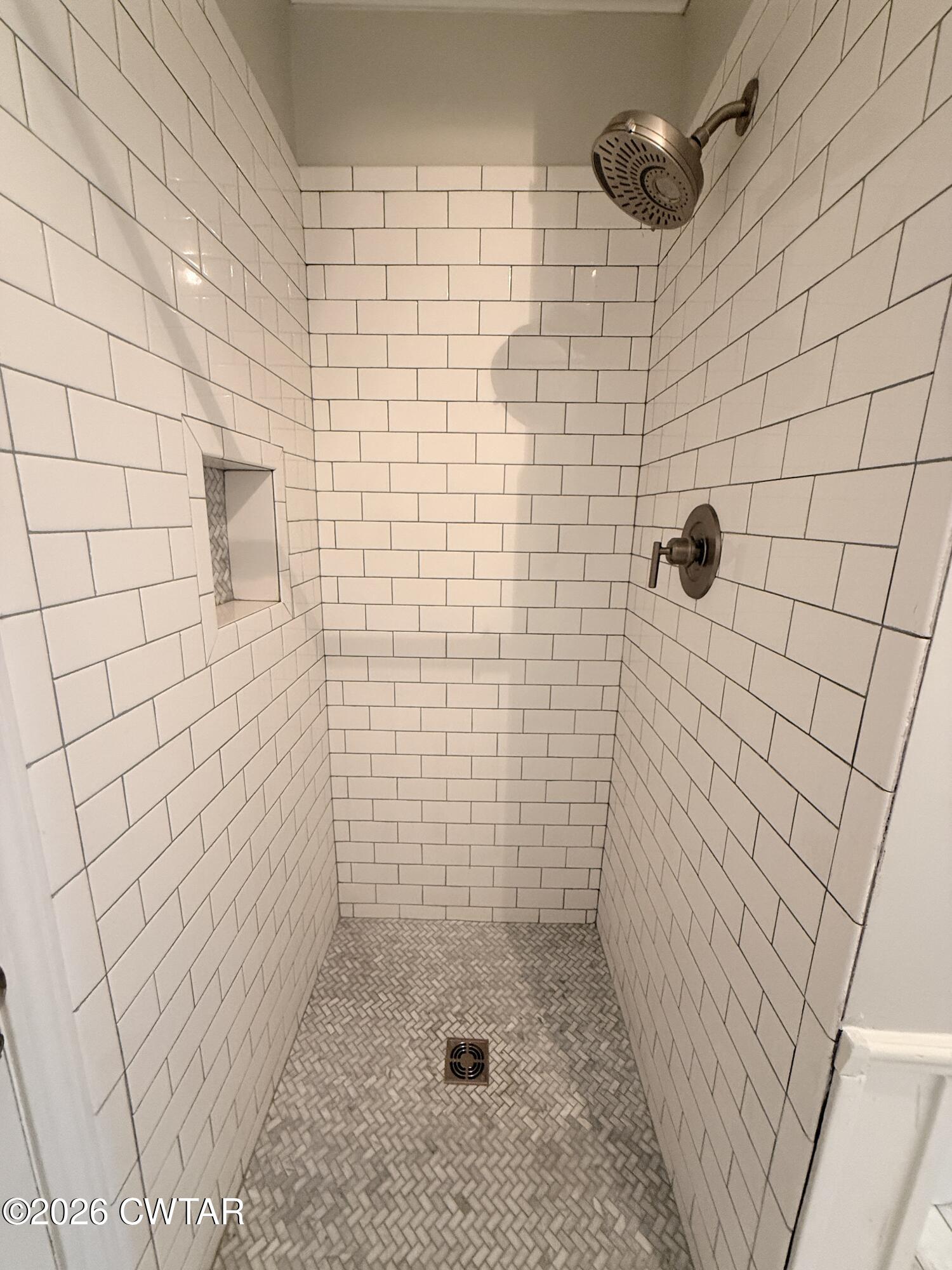 2787 Meacham Road Dyersburg, TN 38024 - Photo 42 of 45 a bathroom with a shower