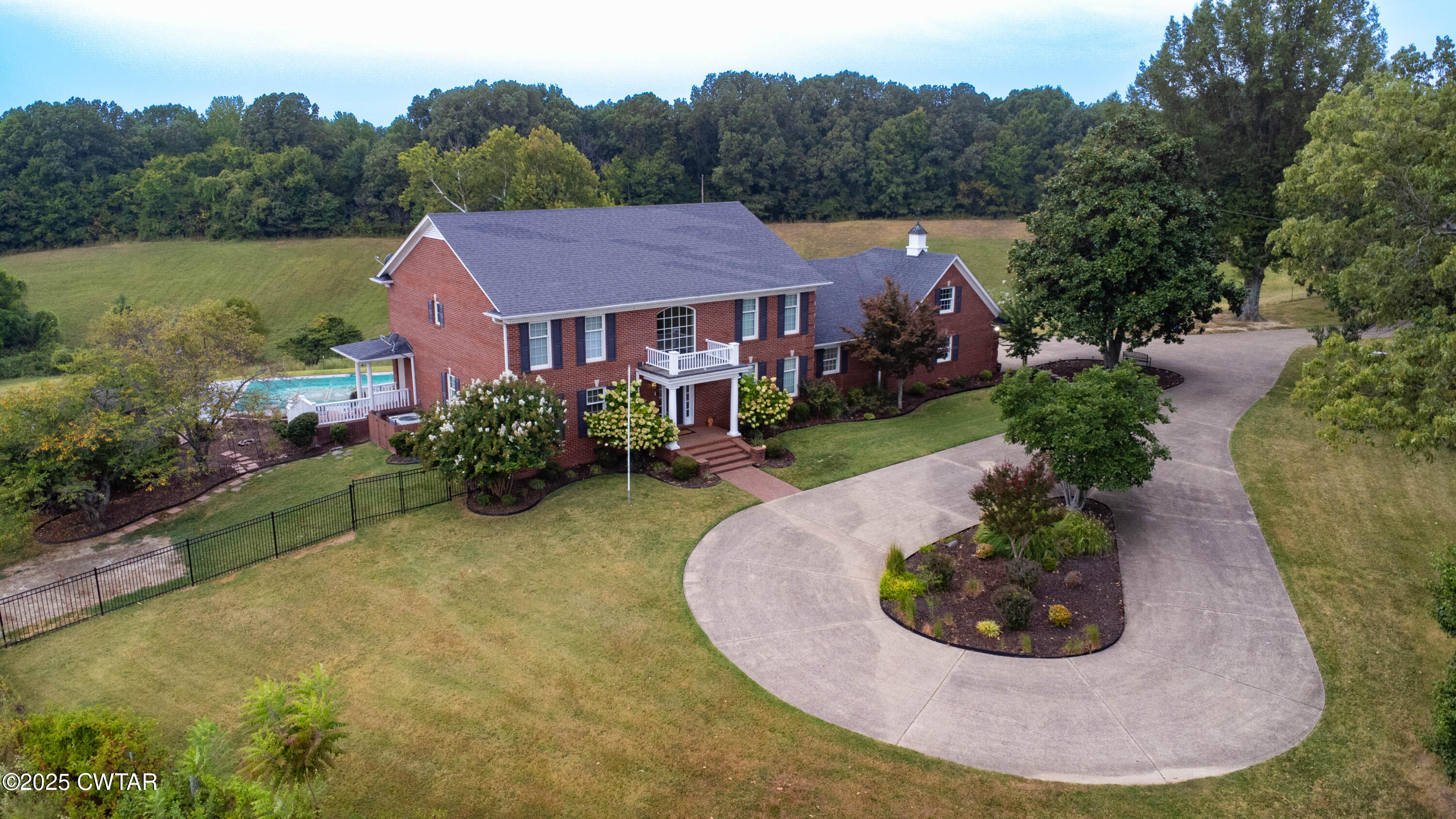 2787 Meacham Road Dyersburg, TN 38024 - Photo 6 of 45 an aerial view of a house