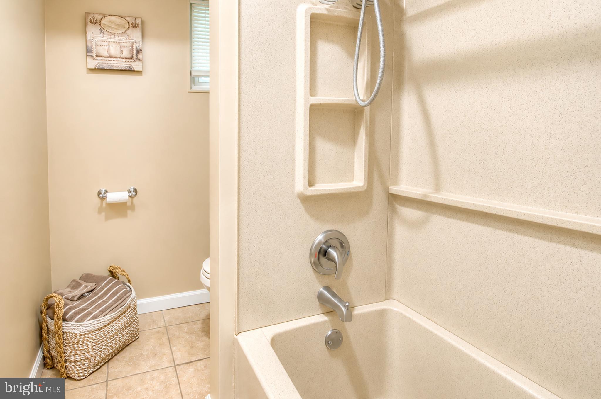 32 Bryant Road Turnersville, NJ 08012 - Photo 25 of 33 a bathroom with a sink and a bathtub