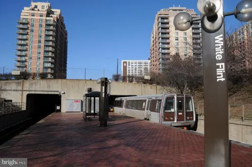 a front view of a building with retail shops