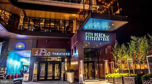 a view of a building with a potted plant