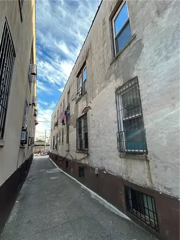 a view of a street with building in the background