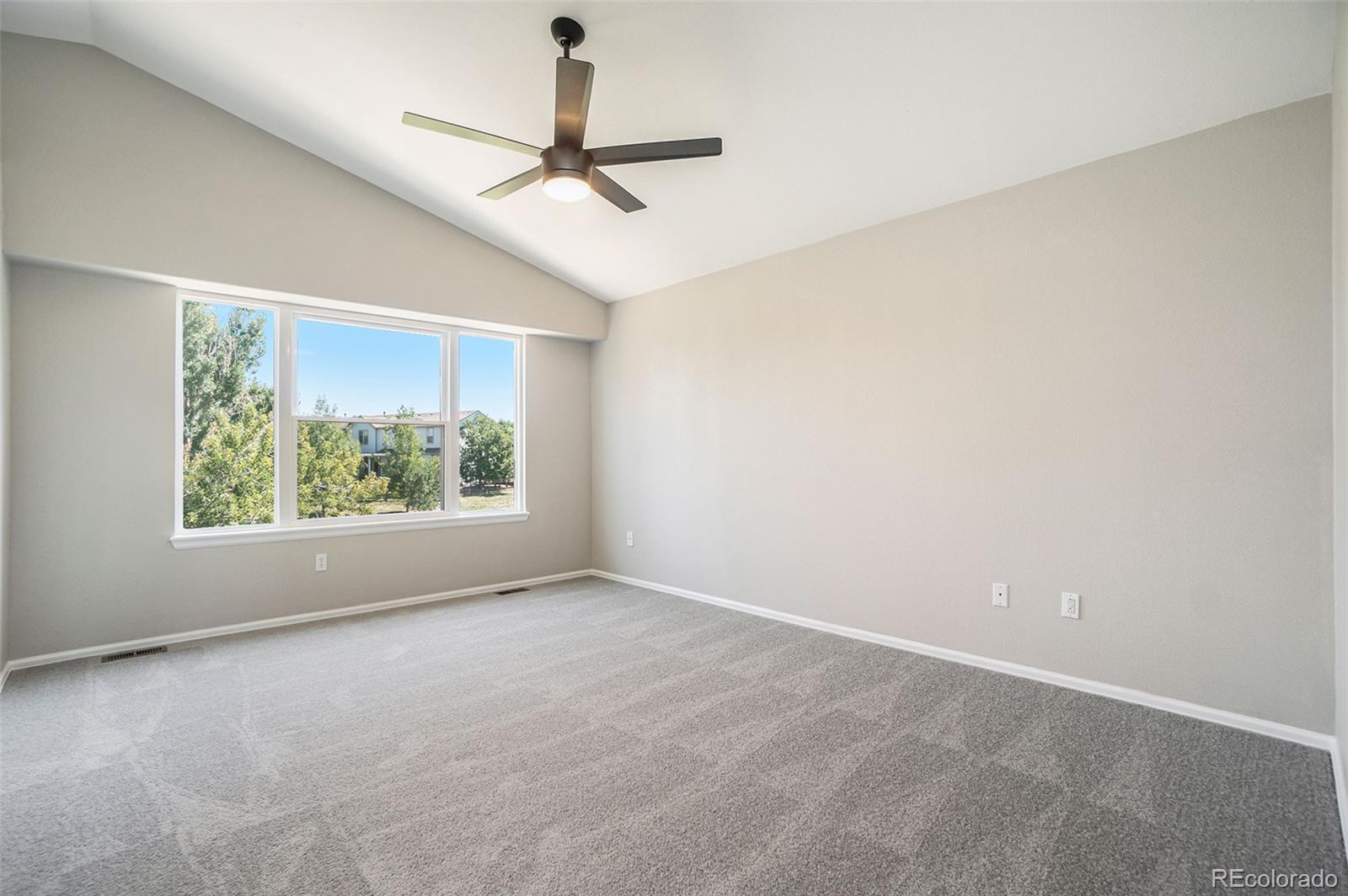 6000 South Summer Ridge Way Castle Rock, CO 80109 - Photo 13 of 19 a view of a room with a window and a ceiling fan