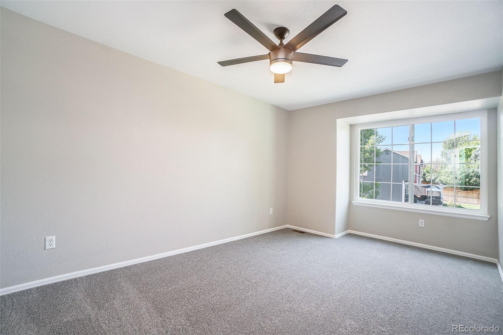 6000 South Summer Ridge Way Castle Rock, CO 80109 - Photo 15 of 19 an empty room with a window