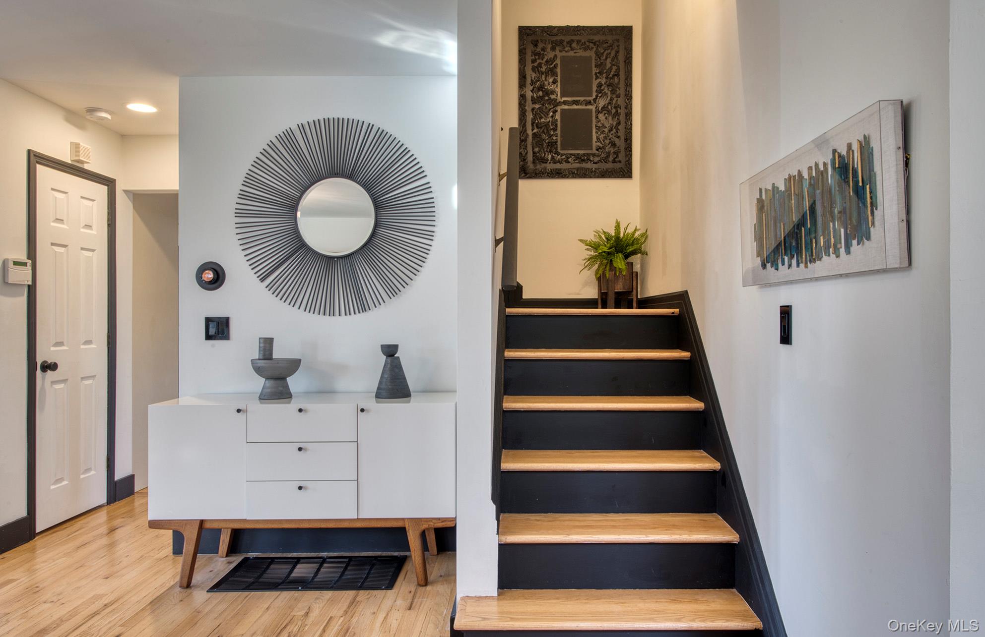 66 Knoll Road Southampton, NY 11968 - Photo 19 of 31 a view of entryway and hall with wooden floor