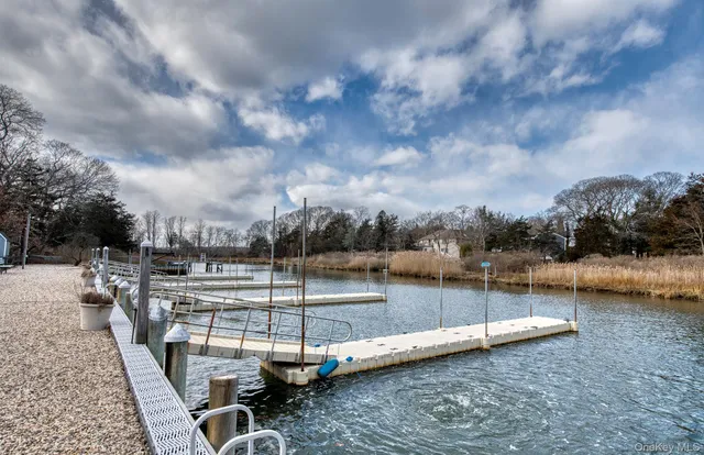 a view of a lake with sitting area