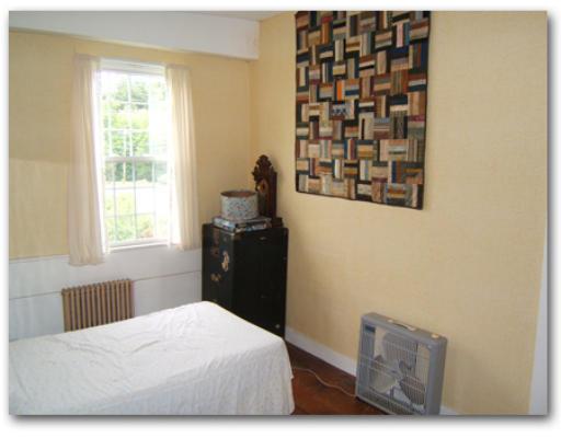 78 Ashfield Road Buckland, MA 01370 - Photo 7 of 7 a bedroom with a bed and a window