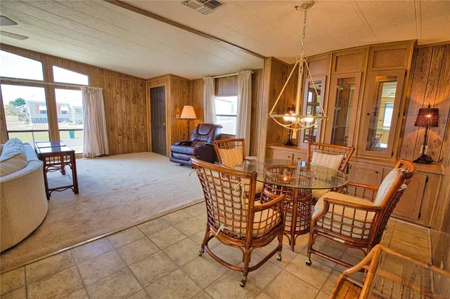 a view of a livingroom with furniture window and outside view