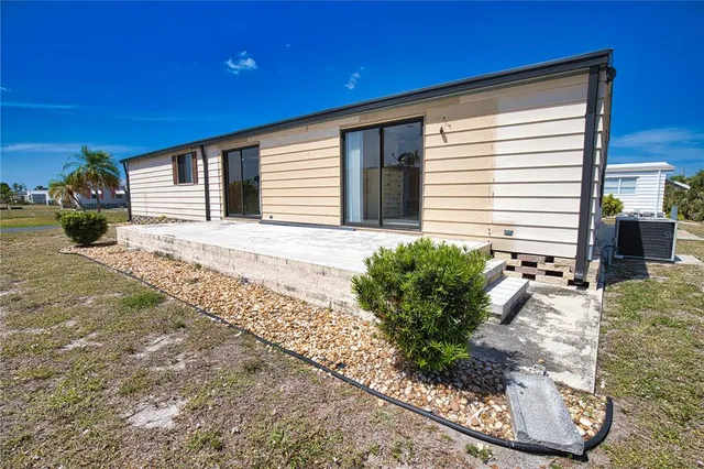 a house view with a backyard space