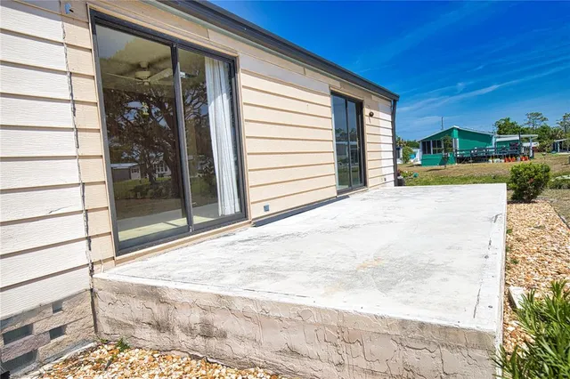 a view of a backyard of a house