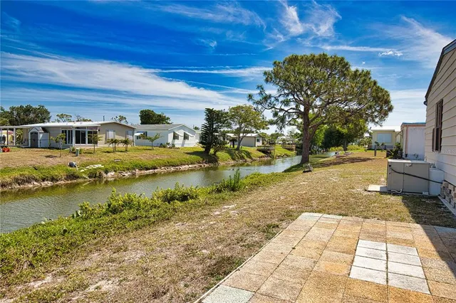 a view of residential houses with outdoor space