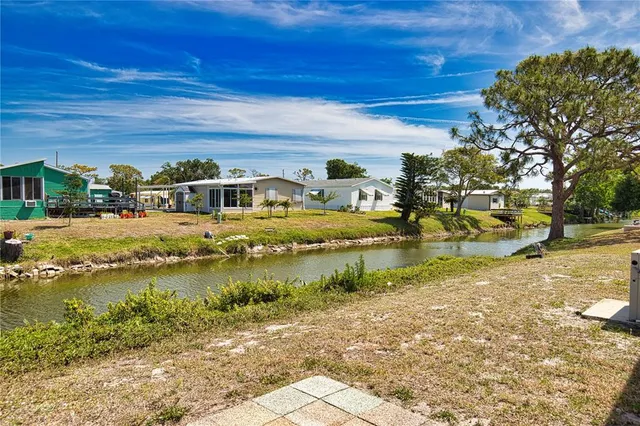 a view of residential houses with outdoor space