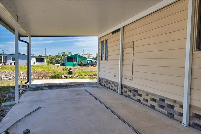 a view of an empty room with a sink