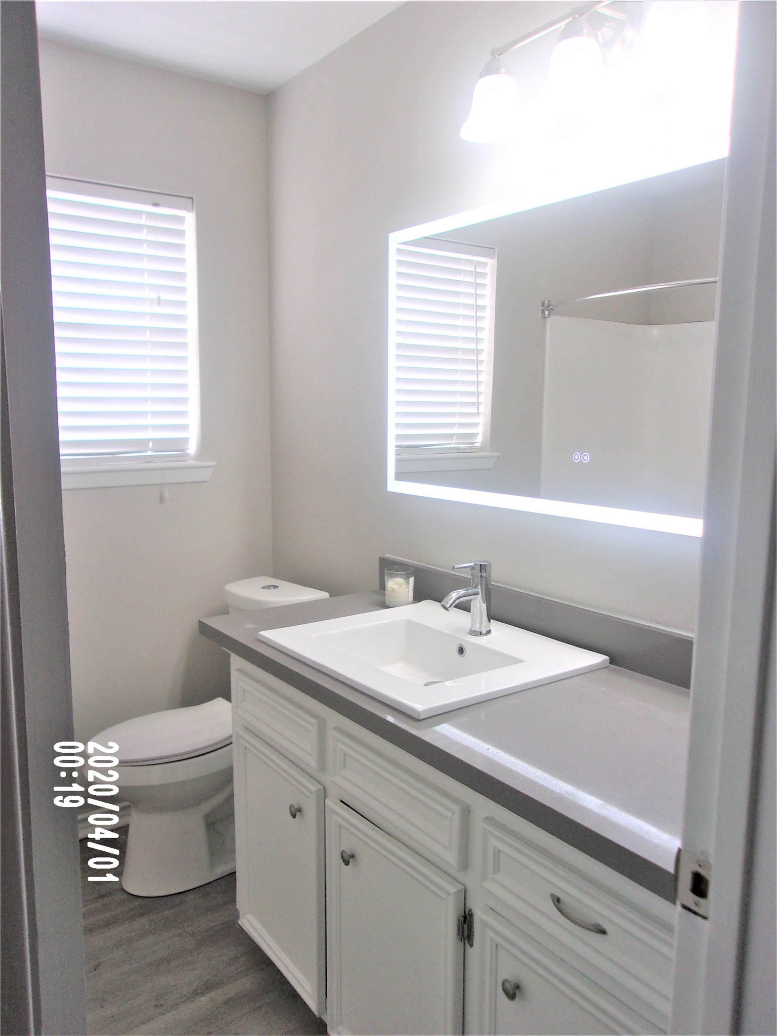 2015 Cannonade Drive Pasadena, TX 77503 - Photo 14 of 17 a bathroom with a sink a toilet and a window