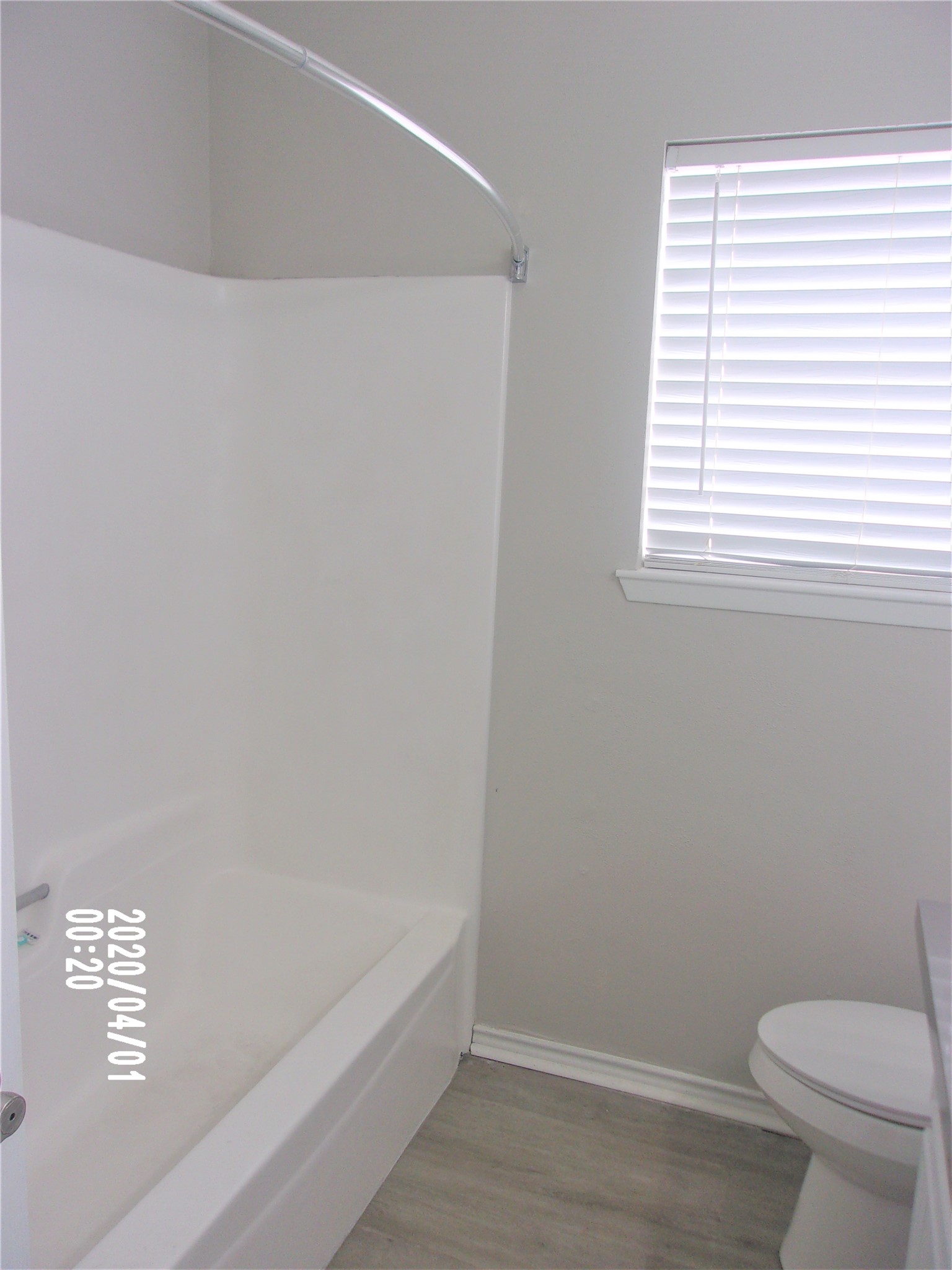 2015 Cannonade Drive Pasadena, TX 77503 - Photo 15 of 17 a bathroom with a toilet and a window