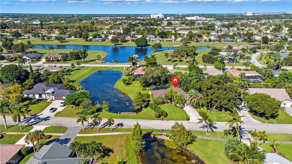 2261 Kings Lake Boulevard Naples, FL 34112 - Photo 35 of 43 a view of a city