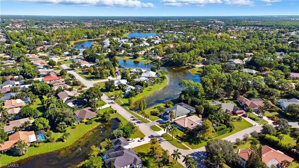 2261 Kings Lake Boulevard Naples, FL 34112 - Photo 38 of 43 a view of a city