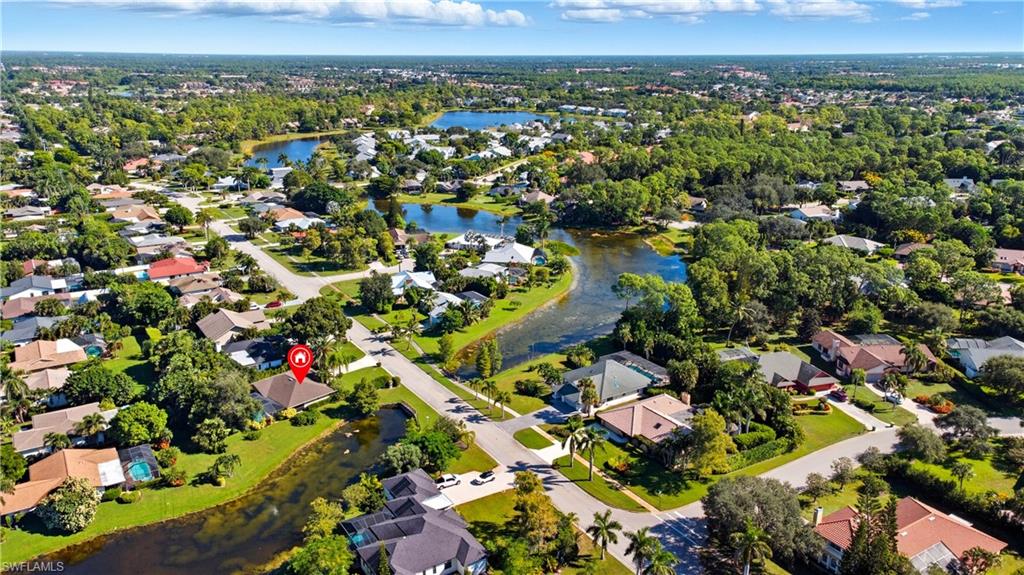 2261 Kings Lake Boulevard Naples, FL 34112 - Photo 39 of 43 a view of a city
