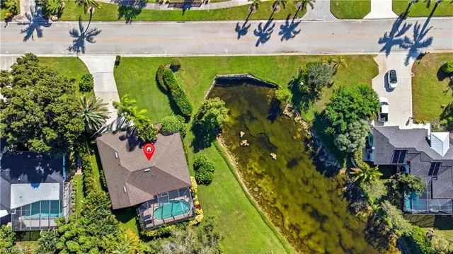 an aerial view of a house with a garden